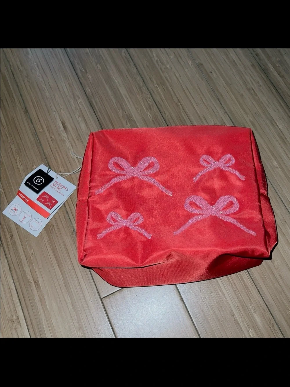 New red cosmetic bag with pink sequin bows